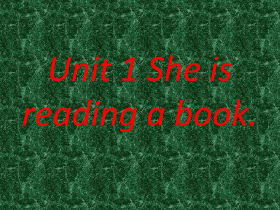 Unit1 She is reading a book.PPT_第1页